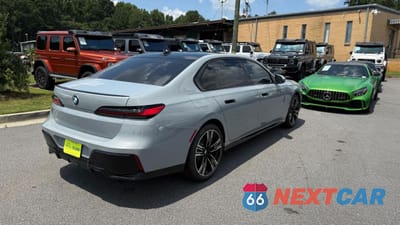 Czwarte zdjęcie samochodu z boku: 2023 BMW 740 I VIN:WBA23EH00PCM28450 - miniatura