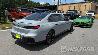 Czwarte zdjęcie samochodu z boku: 2023 BMW 740 I VIN:WBA23EH00PCM28450 - miniatura
