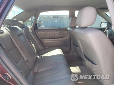Zdjęcie 10 z 14 samochodu: 2003 TOYOTA AVALON XL VIN:4T1BF28B73U332597 - miniatura