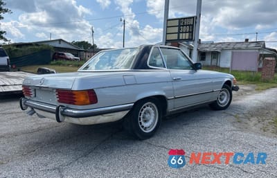 Czwarte zdjęcie samochodu z boku: 1985 MERCEDES BENZ 280SL VIN:WDB1070421A024836 - miniatura