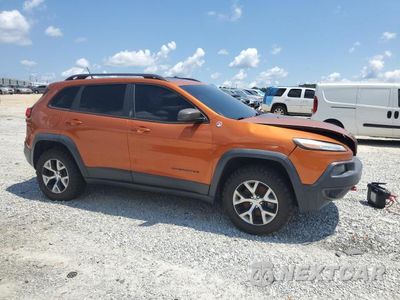 Czwarte zdjęcie samochodu z boku: 2014 JEEP CHEROKEE TRAILHAWK VIN:1C4PJMBS1EW246688 - miniatura