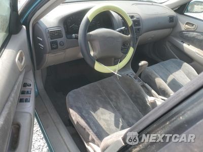 Zdjęcie 8 z 12 samochodu: 1999 TOYOTA COROLLA VE VIN:1NXBR12E7XZ186275 - miniatura