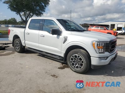 Czwarte zdjęcie samochodu z boku: 2021 FORD F150 SUPERCREW VIN:1FTEW1EP0MKE58003 - miniatura