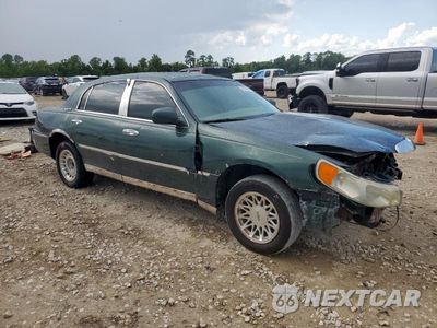 Czwarte zdjęcie samochodu z boku: 2000 LINCOLN TOWN CAR EXECUTIVE VIN:1LNHM81W8YY820974 - miniatura