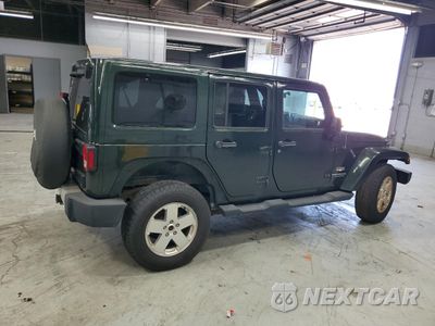Trzecie zdjęcie samochodu z tyłu: 2011 JEEP WRANGLER UNLIMITED SAHARA VIN:1J4HA5H12BL516222 - miniatura
