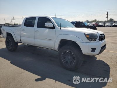 Czwarte zdjęcie samochodu z boku: 2012 TOYOTA TACOMA DOUBLE CAB LONG BED VIN:3TMMU4FN7CM039010 - miniatura
