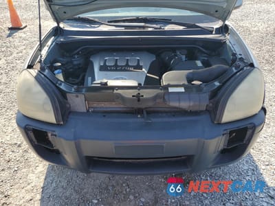 Zdjęcie 12 z 14 samochodu: 2005 HYUNDAI TUCSON GLS VIN:KM8JN72D05U139135 - miniatura