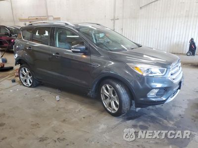 Czwarte zdjęcie samochodu z boku: 2019 FORD ESCAPE TITANIUM VIN:1FMCU9J93KUA05784 - miniatura