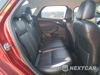 Zdjęcie 10 z 12 samochodu: 2014 FORD FOCUS TITANIUM VIN:1FADP3J22EL181712 - miniatura