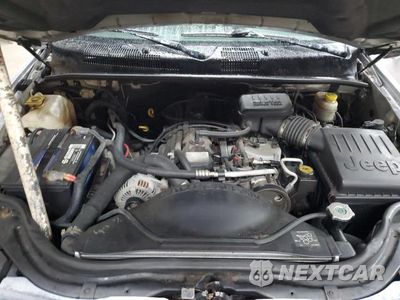 Zdjęcie 12 z 13 samochodu: 2004 JEEP GRAND CHEROKEE LAREDO VIN:1J4GW58S04C408898 - miniatura