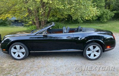 Zdjęcie 12 z 14 samochodu: 2007 BENTLEY CONTINENTAL GTC VIN:SCBDR33W97C045720 - miniatura