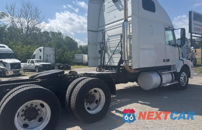 Czwarte zdjęcie samochodu z boku: 2003 VOLV VN VNL - TRUCKS VIN:4V4NC9JH83N348324 - miniatura