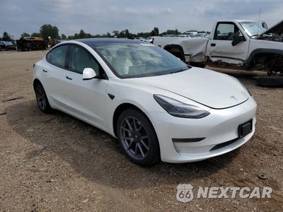 Czwarte zdjęcie samochodu z boku: 2023 TESLA MODEL 3 VIN:5YJ3E1EA3PF671633 - miniatura