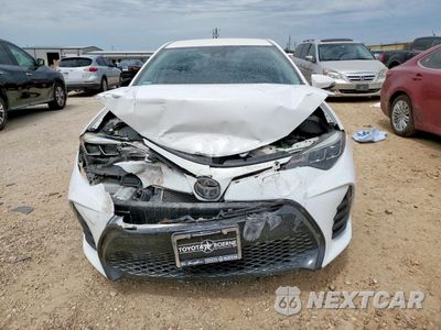 Piąte zdjęcie samochodu w środku: 2018 TOYOTA COROLLA L VIN:5YFBURHE7JP787439 - miniatura