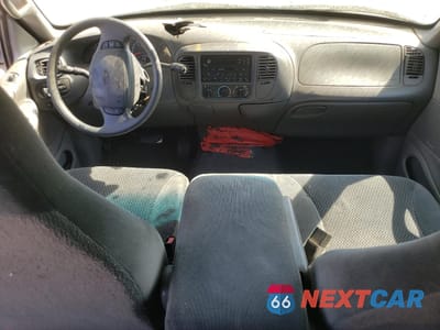 Zdjęcie 8 z 14 samochodu: 2000 FORD EXPEDITION XLT VIN:1FMRU15L6YLB56943 - miniatura