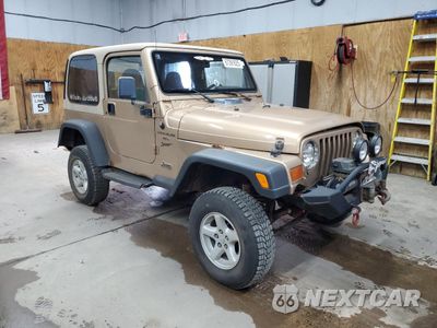 Czwarte zdjęcie samochodu z boku: 1999 JEEP WRANGLER / TJ SPORT VIN:1J4FY19S1XP492501 - miniatura