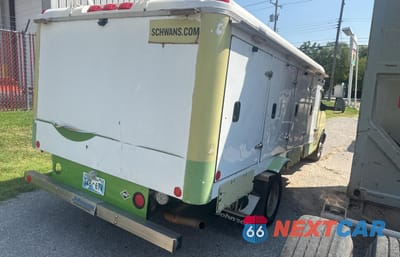 Czwarte zdjęcie samochodu z boku: 2014 GMC SAVANA CUTAWAY G4500 VIN:1GD675CB2E1167134 - miniatura