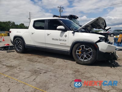 Czwarte zdjęcie samochodu z boku: 2022 RIVIAN R1T LAUNCH EDITION VIN:7FCTGAAL4NN000031 - miniatura