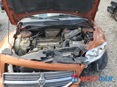 Zdjęcie 11 z 13 samochodu: 2011 DODGE CALIBER MAINSTREET VIN:1B3CB3HA6BD294443 - miniatura