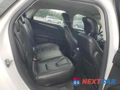 Zdjęcie 10 z 12 samochodu: 2014 FORD FUSION TITANIUM VIN:3FA6P0K92ER118775 - miniatura