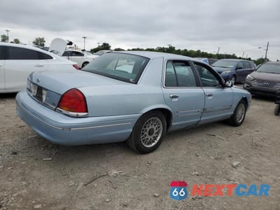Trzecie zdjęcie samochodu z tyłu: 1999 FORD CROWN VICTORIA LX VIN:2FAFP74W5XX121198 - miniatura