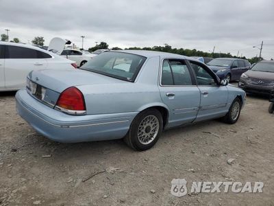 Trzecie zdjęcie samochodu z tyłu: 1999 FORD CROWN VICTORIA LX VIN:2FAFP74W5XX121198 - miniatura