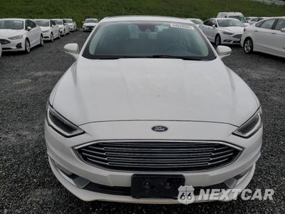 Piąte zdjęcie samochodu w środku: 2017 FORD FUSION SE HYBRID VIN:3FA6P0LUXHR359538 - miniatura