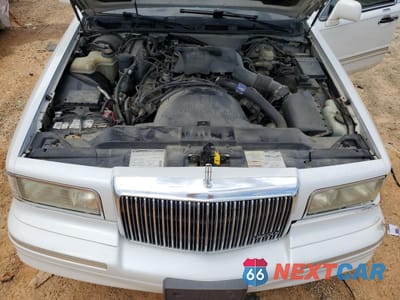 Zdjęcie 11 z 14 samochodu: 1996 LINCOLN TOWN CAR SIGNATURE VIN:1LNLM82W8TY720942 - miniatura