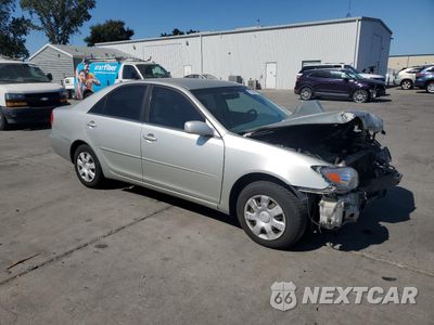 Czwarte zdjęcie samochodu z boku: 2002 TOYOTA CAMRY LE VIN:JTDBE32K420127184 - miniatura