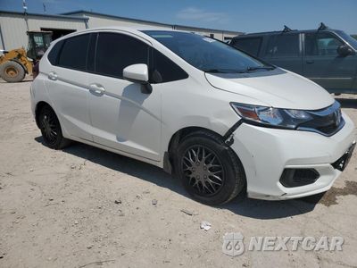 Czwarte zdjęcie samochodu z boku: 2019 HONDA FIT LX VIN:3HGGK5H4XKM702275 - miniatura
