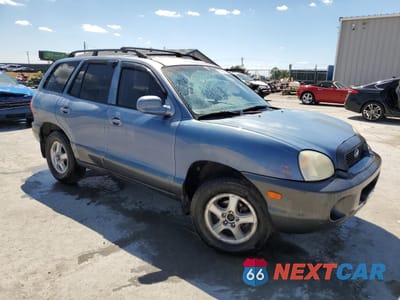 Czwarte zdjęcie samochodu z boku: 2002 HYUNDAI SANTA FE GLS VIN:KM8SC13D92U218496 - miniatura