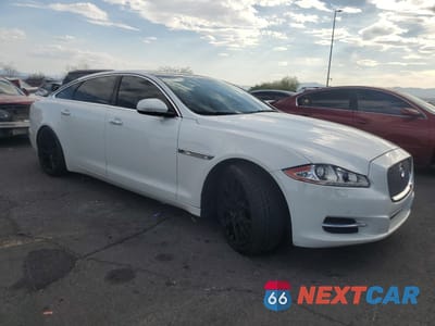 Czwarte zdjęcie samochodu z boku: 2015 JAGUAR XJL PORTFOLIO VIN:SAJWJ2GD9F8V80808 - miniatura
