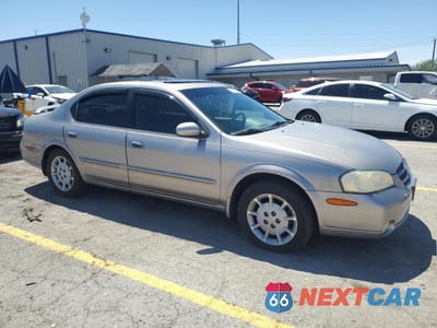 Czwarte zdjęcie samochodu z boku: 2001 NISSAN MAXIMA GXE VIN:JN1CA31D51T832997 - miniatura