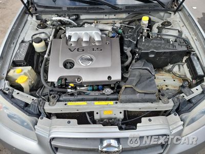 Zdjęcie 11 z 12 samochodu: 2003 NISSAN MAXIMA GLE VIN:JN1DA31D83T513584 - miniatura