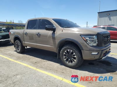 Czwarte zdjęcie samochodu z boku: 2021 NISSAN TITAN SV VIN:1N6AA1ED9MN512607 - miniatura