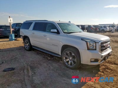 Czwarte zdjęcie samochodu z boku: 2016 GMC YUKON XL K1500 SLT VIN:1GKS2GKC5GR135018 - miniatura