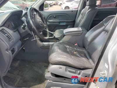 Zdjęcie 7 z 13 samochodu: 2004 HONDA PILOT EXL VIN:2HKYF18794H532770 - miniatura