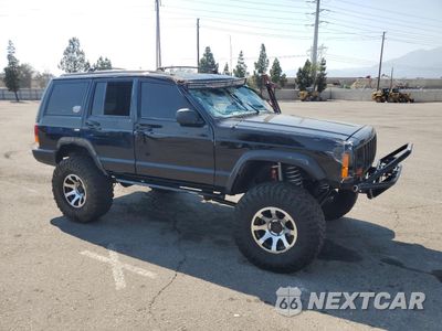 Czwarte zdjęcie samochodu z boku: 1997 JEEP CHEROKEE SE VIN:1J4FJ28S0VL509918 - miniatura