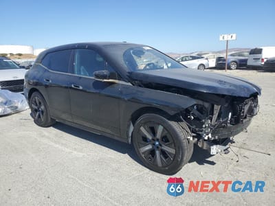 Czwarte zdjęcie samochodu z boku: 2024 BMW IX XDRIVE50 VIN:WB523CF0XRCP60355 - miniatura