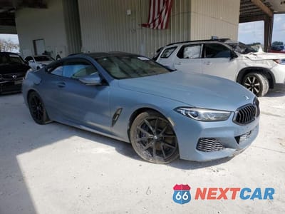 Czwarte zdjęcie samochodu z boku: 2019 BMW M850XI VIN:WBABC4C58KBU96930 - miniatura