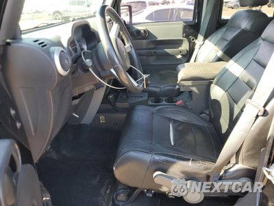 Zdjęcie 7 z 15 samochodu: 2010 JEEP WRANGLER UNLIMITED SAHARA VIN:1J4HA5H17AL126036 - miniatura