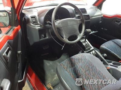 Zdjęcie 8 z 13 samochodu: 1997 GEO TRACKER VIN:2CNBJ1864V6919787 - miniatura