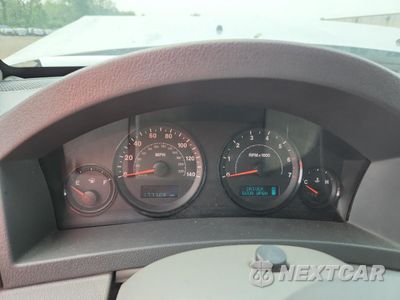 Zdjęcie 9 z 12 samochodu: 2005 JEEP GRAND CHEROKEE LAREDO VIN:1J4GR48K05C724787 - miniatura