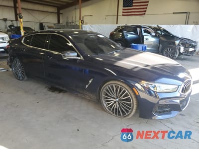 Czwarte zdjęcie samochodu z boku: 2020 BMW M850XI VIN:WBAGV8C02LCD94209 - miniatura