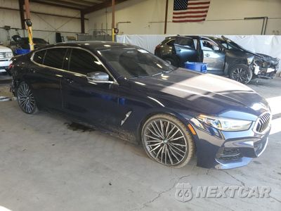 Czwarte zdjęcie samochodu z boku: 2020 BMW M850XI VIN:WBAGV8C02LCD94209 - miniatura