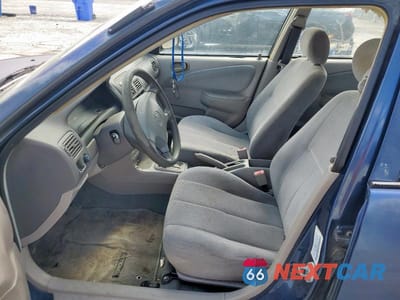 Zdjęcie 7 z 12 samochodu: 2001 TOYOTA COROLLA CE VIN:1NXBR12E01Z506561 - miniatura