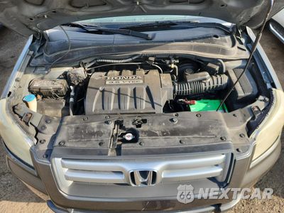 Zdjęcie 12 z 13 samochodu: 2007 HONDA PILOT LX VIN:2HKYF18177H500576 - miniatura