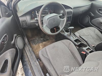 Zdjęcie 8 z 12 samochodu: 2002 SATURN SC1 VIN:1G8ZP12872Z214777 - miniatura