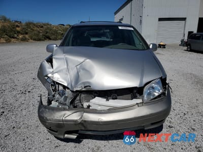 Piąte zdjęcie samochodu w środku: 2001 TOYOTA SIENNA LE VIN:4T3ZF13C81U351186 - miniatura