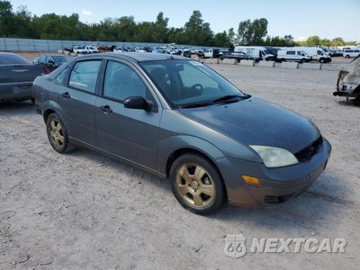 Czwarte zdjęcie samochodu z boku: 2005 FORD FOCUS ZX4 VIN:1FAFP34N35W112850 - miniatura